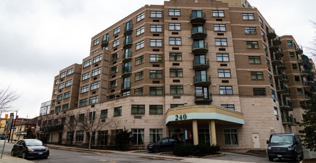 An eight story brown brick building