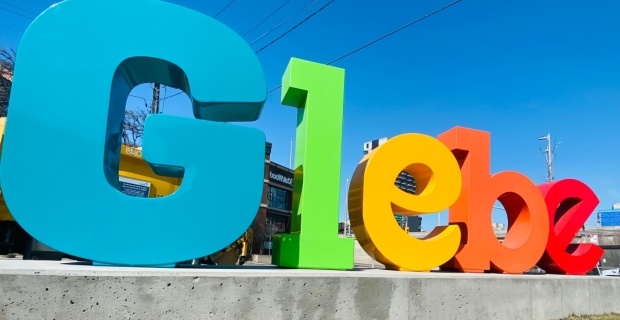 Large multi-coloured letters that says "Glebe"