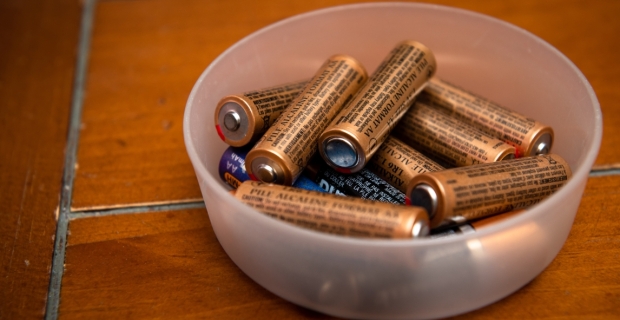 A container of used batteries