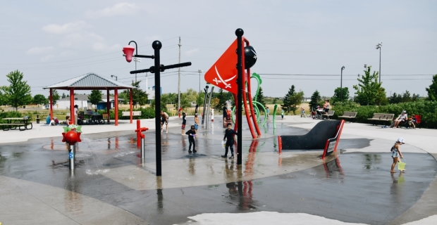 A pirate themed splash pad with kids playing