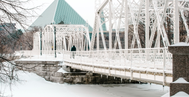 Minto Bridges are steel truss bridges painted white crossing over the Rideau River in New Edinburgh