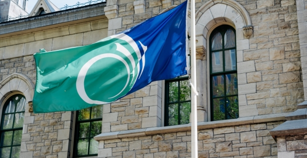 City of Ottawa flag in front of Heritage Building at City Hall