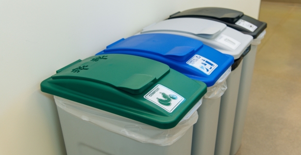 Compost and recycle bins in an office setting